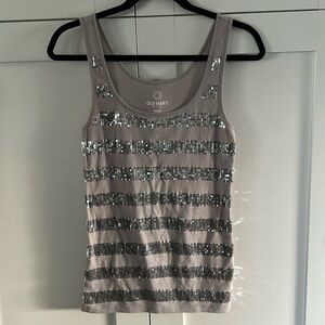 Old navy tank top, silver sequin verticals stripes on the front.
